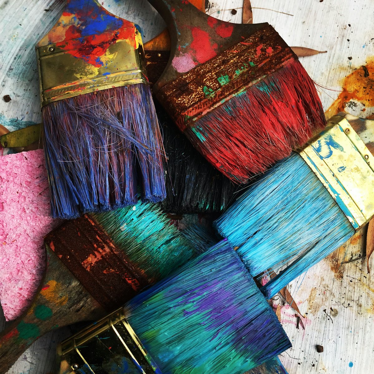 Brushes and paint on a studio table