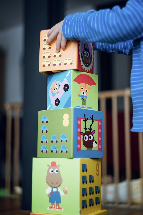 Colorful stacked toy blocks in a nursery