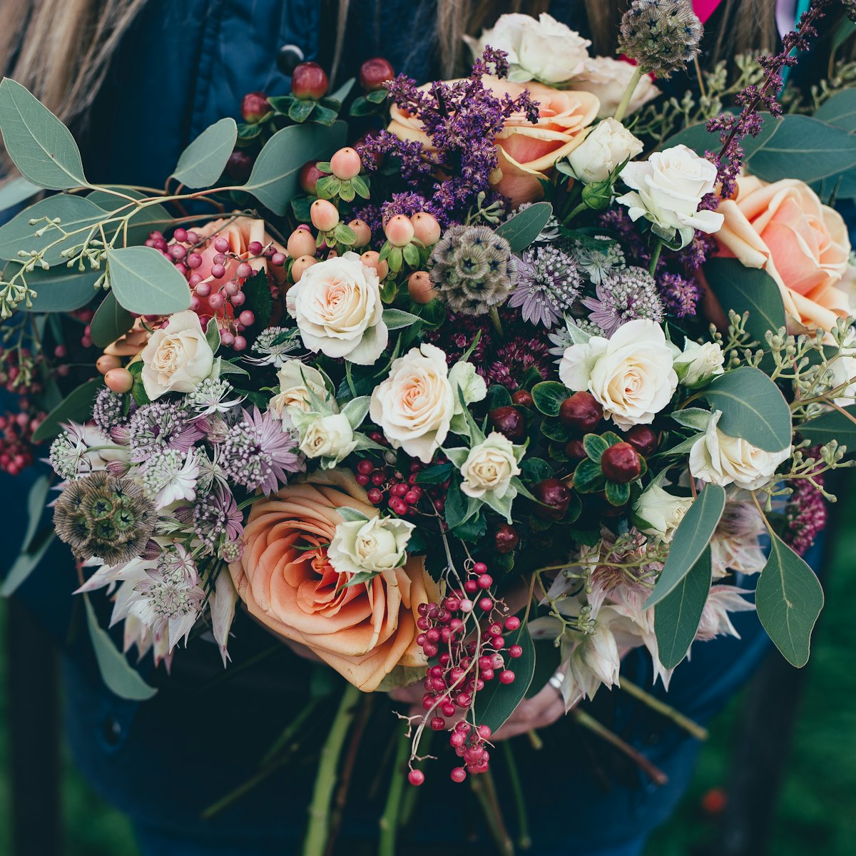 Loose garden-style bouquet in soft pinks and whites