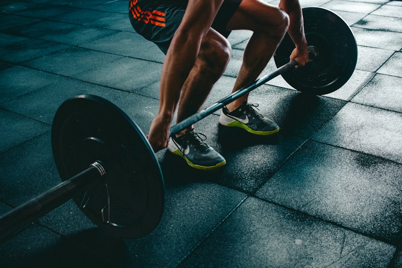 Loaded barbell on a lifting platform