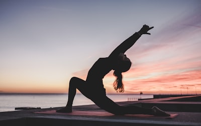 Teacher in a seated yoga pose