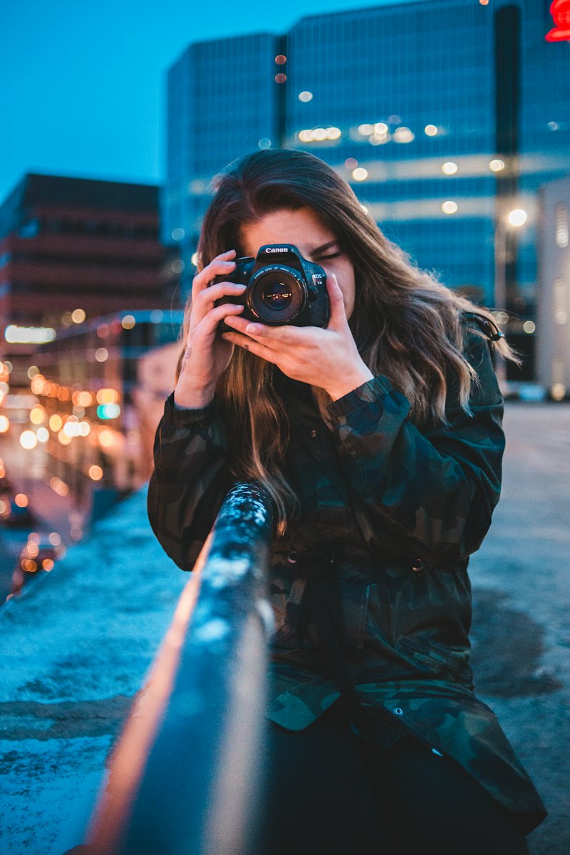 Photographer holding a film camera
